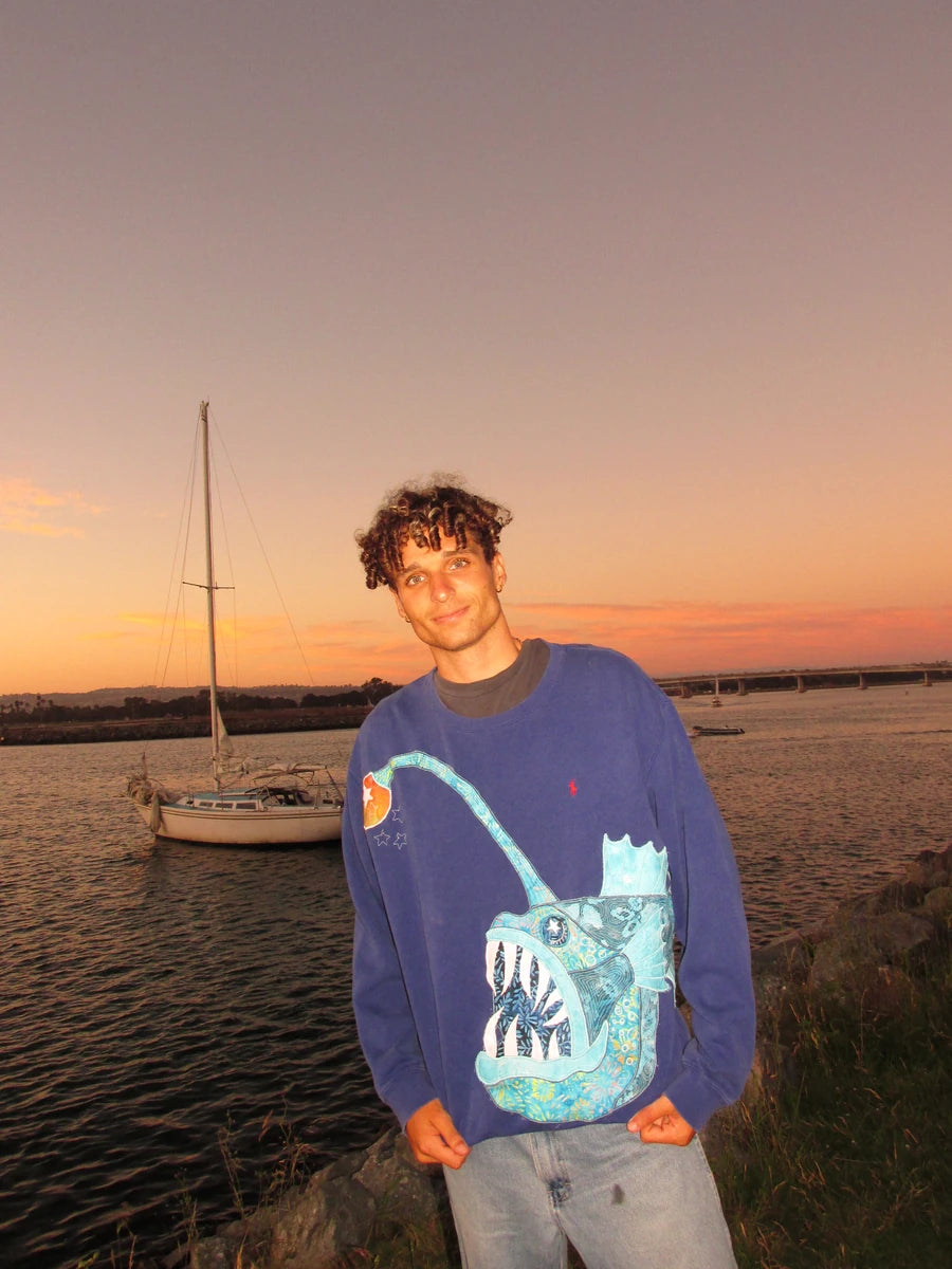 A sewn anglerfish on a Chilis Creations top